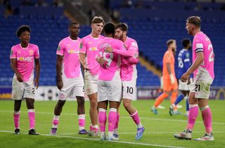 CARDIFF, WALES - AUGUST 28: Cameron Archer of Southampton celebrates scores his team's fifth goal with teammates Adam Lallana during the Carabao Cup Second Round match between Cardiff City and Southampton at Cardiff City Stadium on August 28, 2024 in Cardiff, Wales. (Photo by Ryan Hiscott/Getty Images)