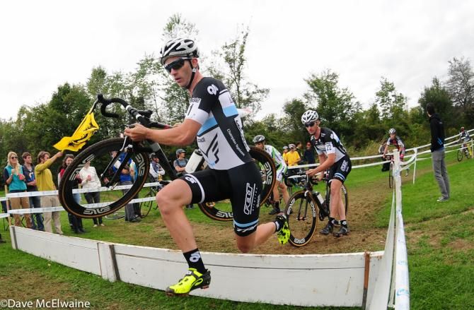 Nick Keough (Keough Cyclocross) running the barriers on lap one