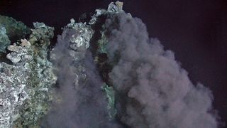 Hydrothermal vents spew hot fluids into icy waters in the ocean depths.