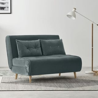haru sofa bed with white walls and light