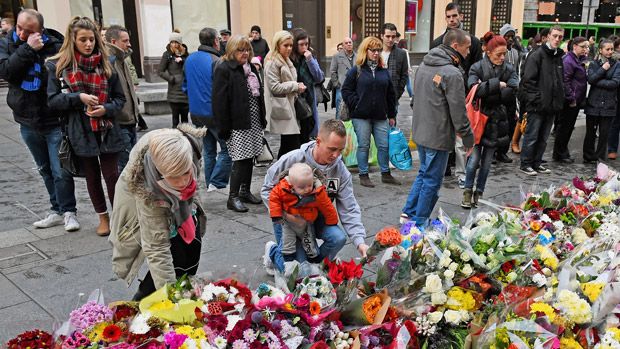 People pay tribute to the victims in Glasgow