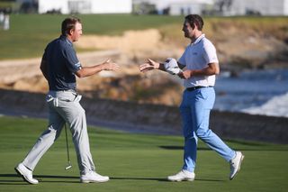Hoge and Cantlay shake hands