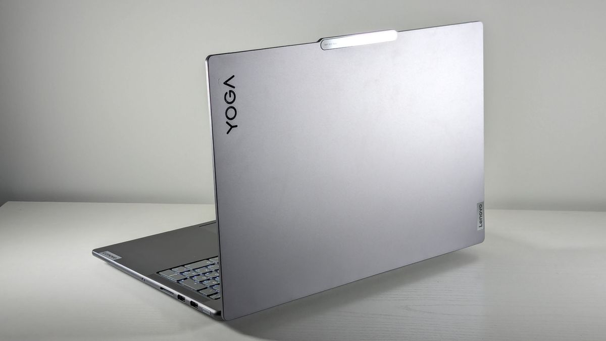 The Lenovo Yoga Pro 9i 16 Gen 9 seen from behind on a white table