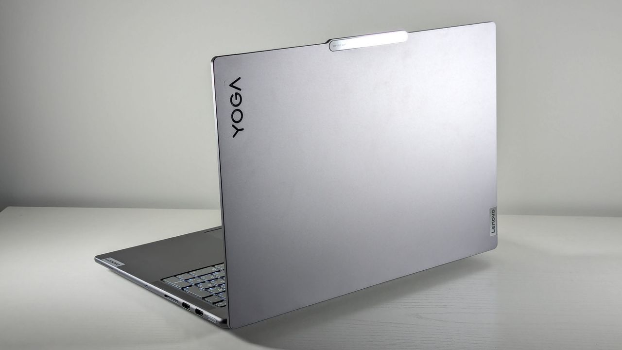 The Lenovo Yoga Pro 9i 16 Gen 9 seen from behind on a white table