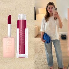 girl in jean and a white top with a blue bag taking a mirror selfie next to two pink lipsticks