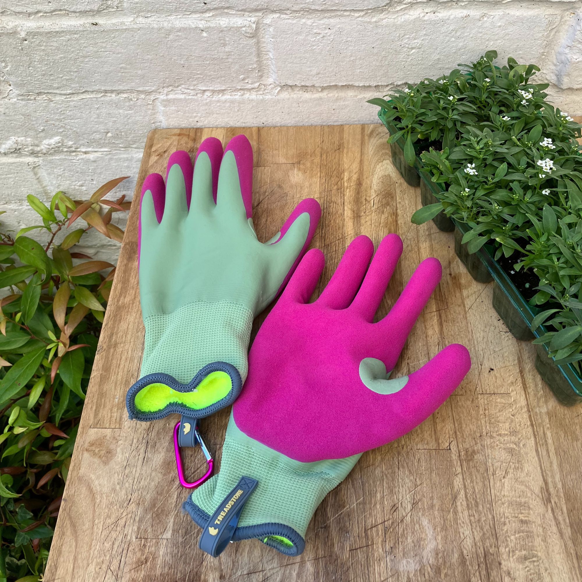 pink and green gardening gloves