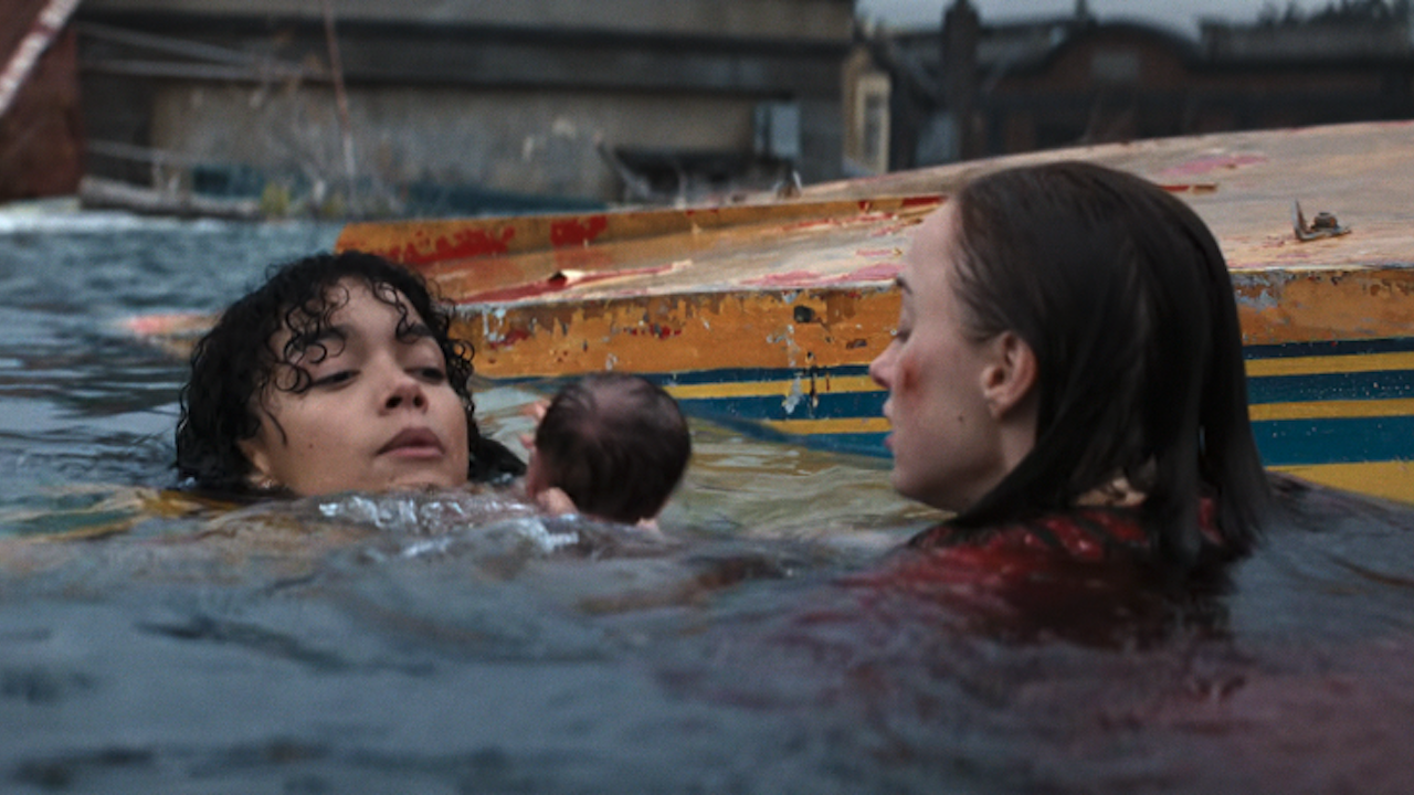 Whitney Peak and Phoebe Dynevor next to tipped over boat in Thrash