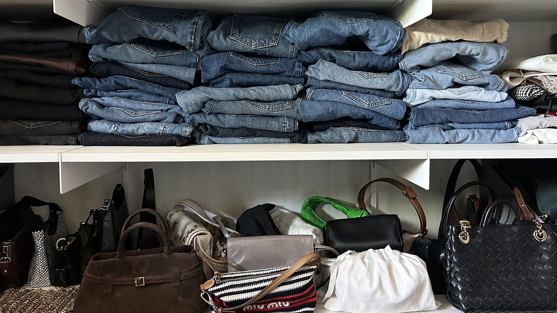 Stack of jeans in a closet