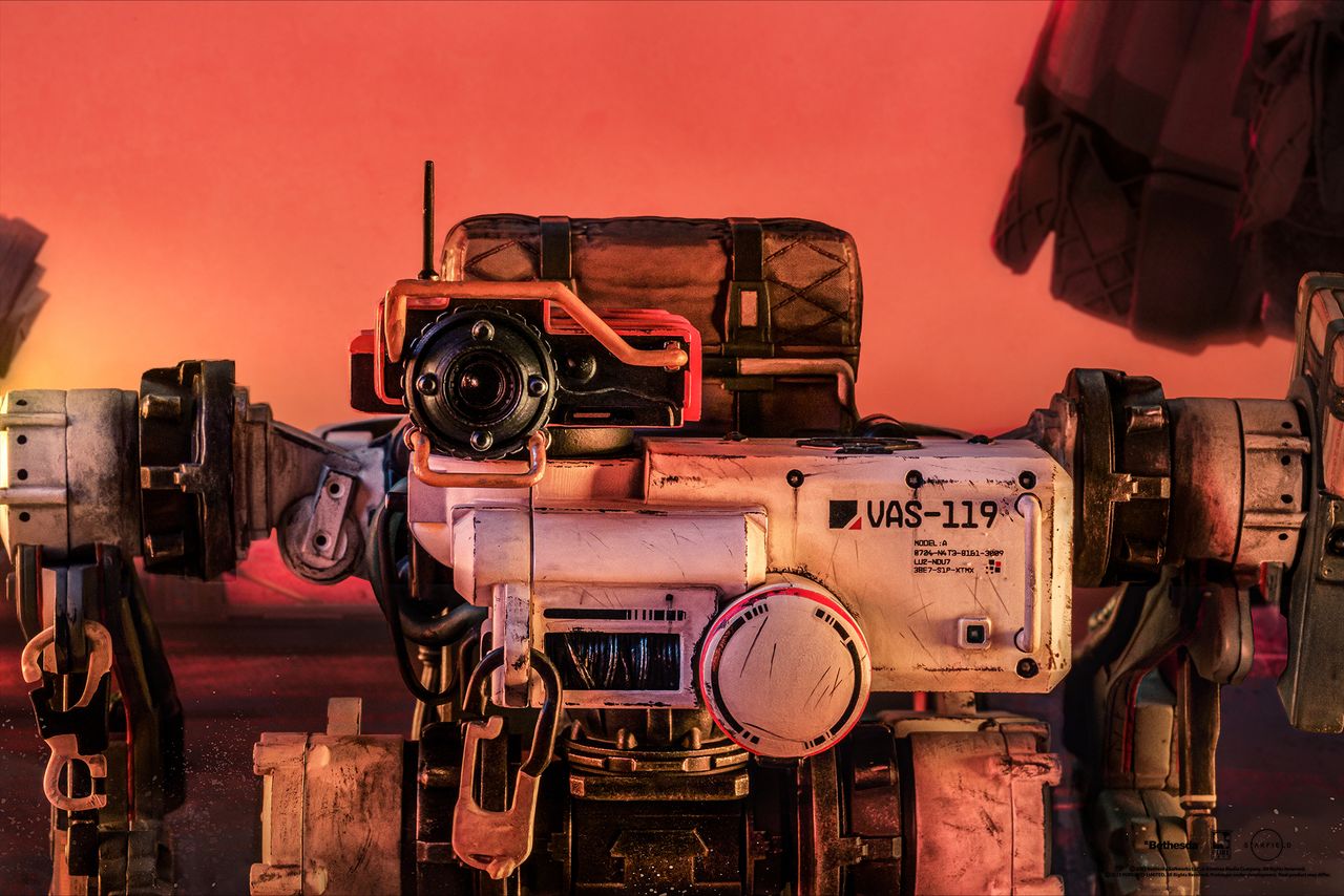 Vasco action figure posed on a sandy planet background