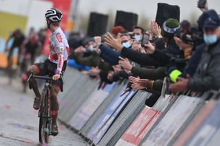 Belgian Eli Iserbyt celebrates as he crosses the finish line to win the mens elite race of the 7th stage out of 16 of the world cup cyclocross in Koksijde Sunday 21 November 2021 BELGA PHOTO DAVID STOCKMAN Photo by DAVID STOCKMANBELGA MAGAFP via Getty Images