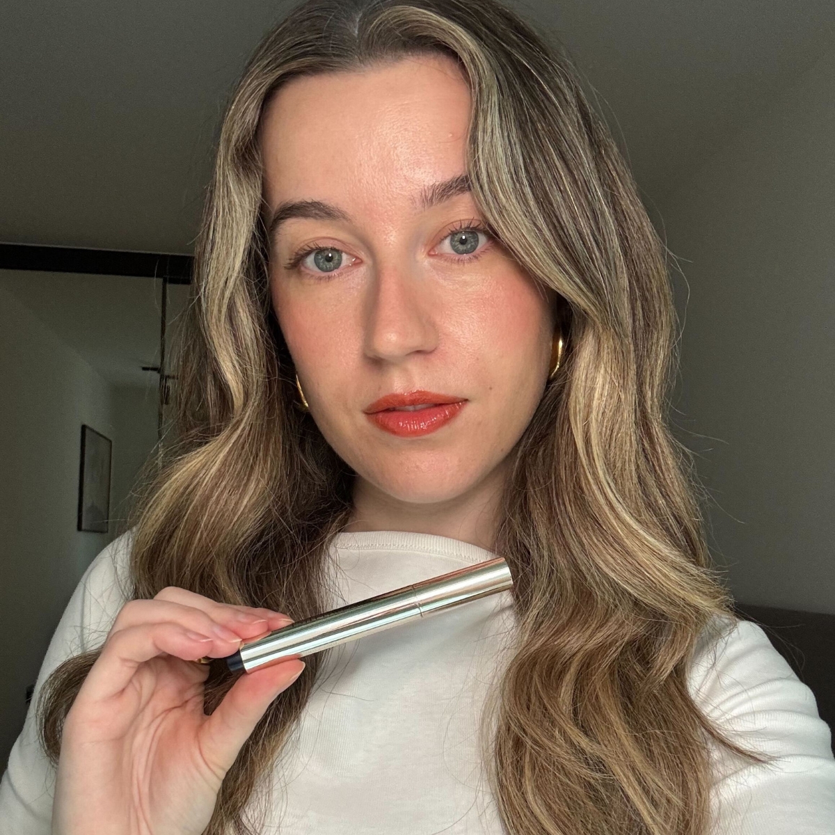 Deputy beauty editor Grace Lindsay testing the Est&eacute;e Lauder Pure Colour Melt-On Glosstick