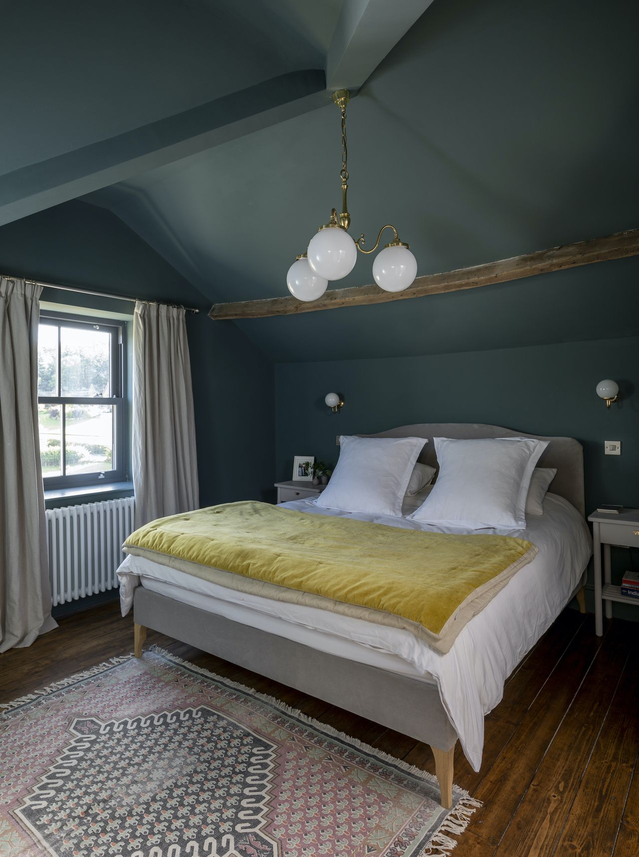 The vaulted ceilings of the bedrooms have been exposed, sacrificing loft storage space but leaving the new rooms feeling more characterful.