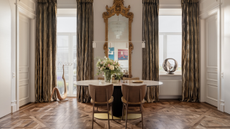 two symmetrical console tables in a hallway