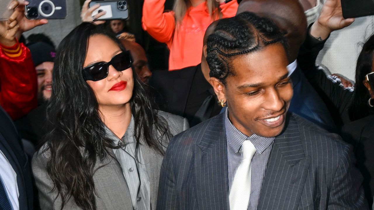 Rihanna and A$AP Rocky wearing coordinating suiting