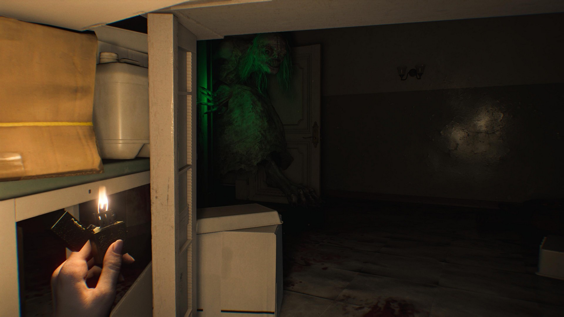 Grace hides under a desk as The Girl leans down to enter a dark room in Resident Evil Requiem