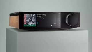 Cambridge Audio Evo 75 on a plinth with teal-grey background