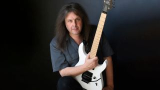 Michael Romeo from Symphony X press shot with guitar 2022