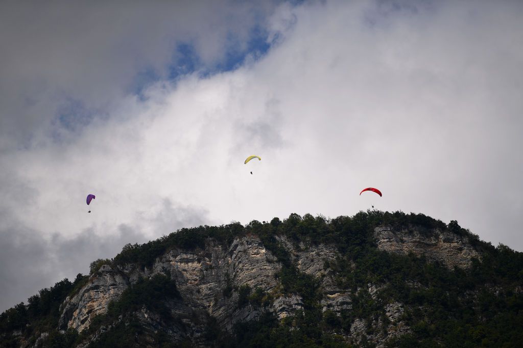 SAINT MARTIN DE BELLEVILLE FRANCE AUGUST 14 Paragliding Lunatics Fans Mountains Landscape during the 72nd Criterium du Dauphine 2020 Stage 3 a 157km stage from Corenc to Saint Martin de Belleville 1419m on August 14 2020 in Saint Martin de Belleville France Photo by Justin SetterfieldGetty Images
