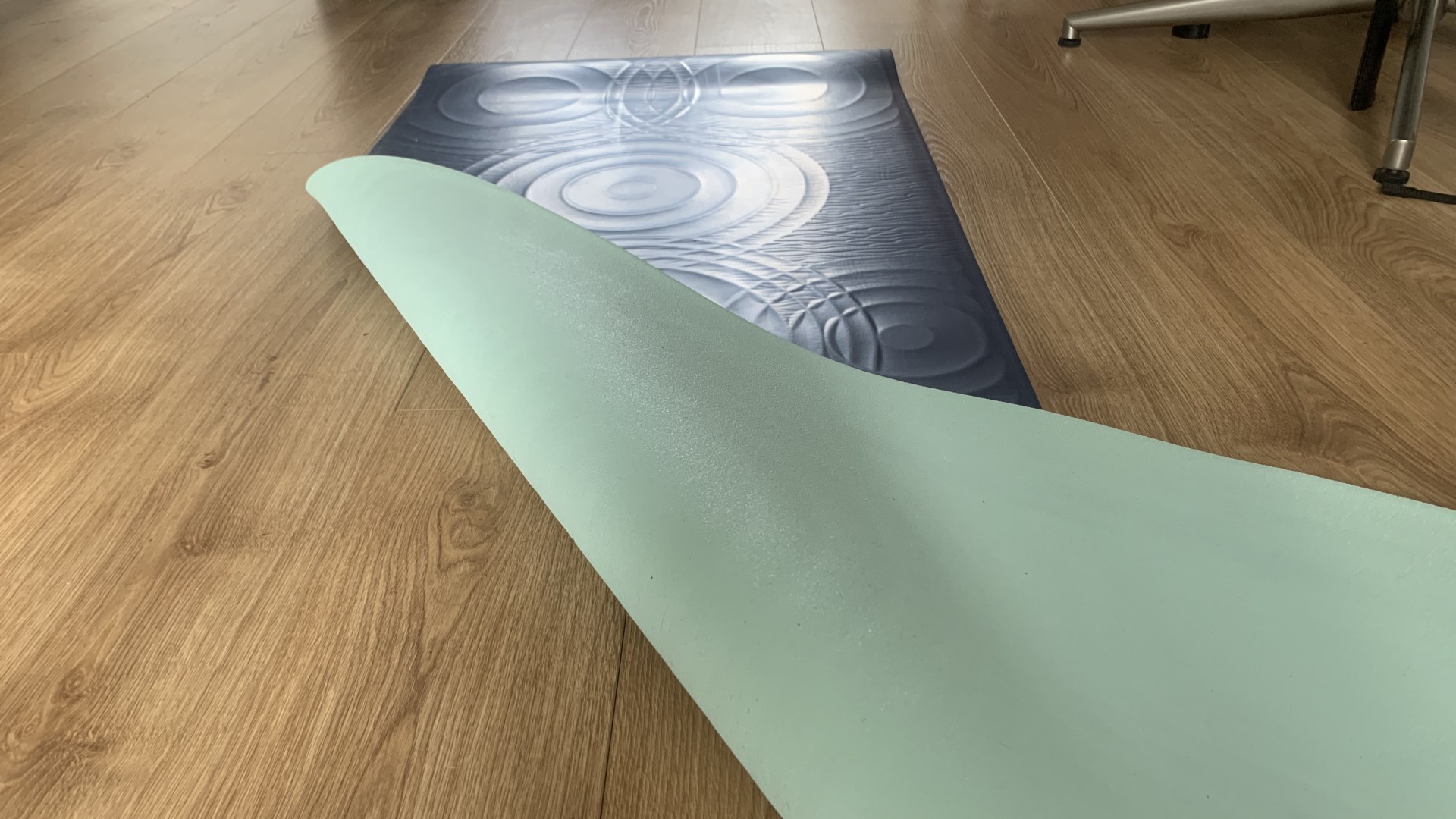 Lululemon Take Form mat rolled out with the corner folded over