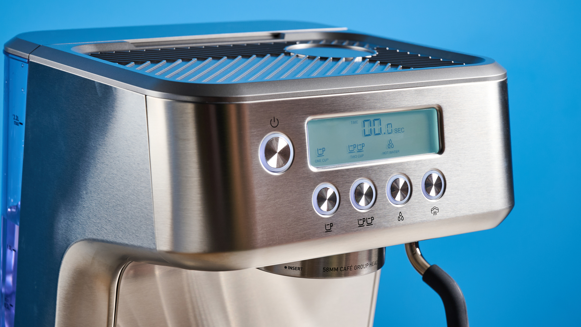 the casabrews ultra espresso machine with 20 bar pressure, a steam wand, LED screen, timer, and tamper accessories, photographed against a blue background