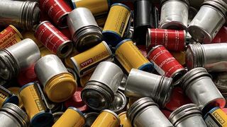 A pile of 35mm film canisters