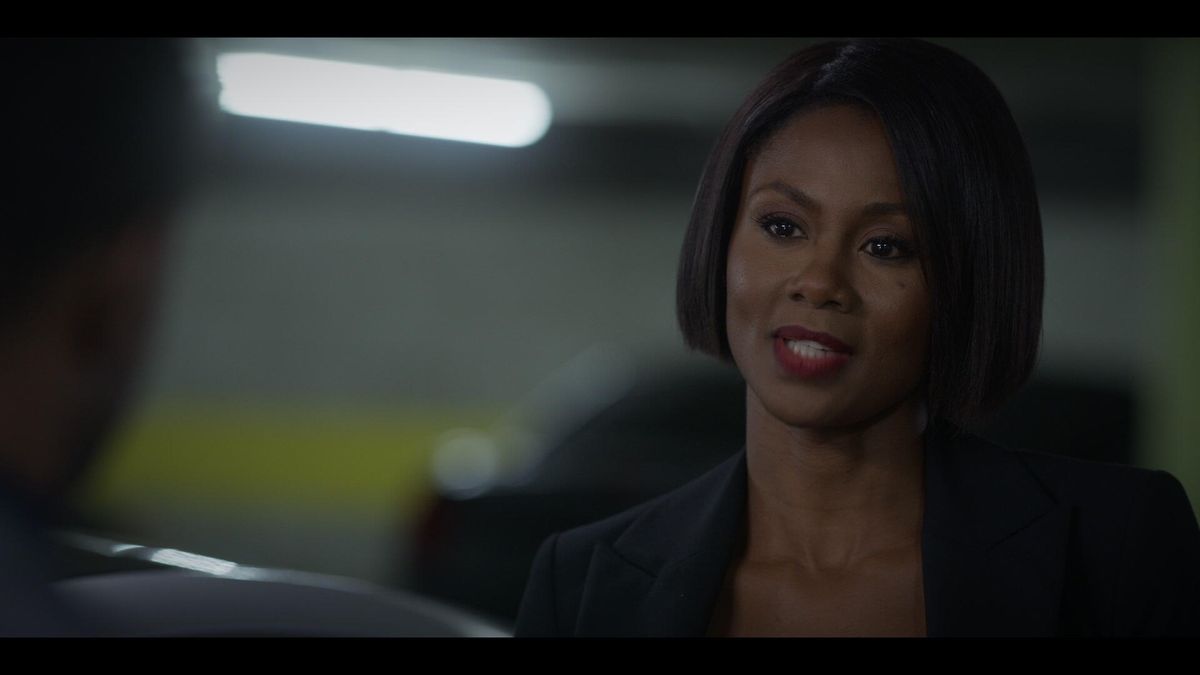 Emayatzy Corinealdi as Jax smiling in Reasonable Doubt