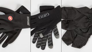 Three pairs of winter cycling gloves laying on a white background