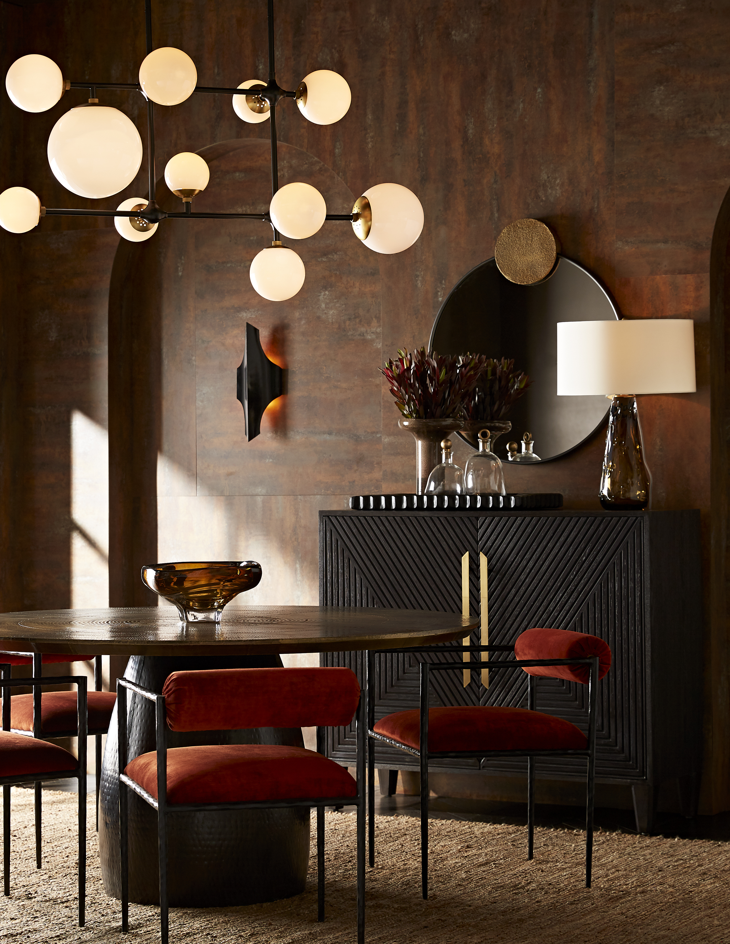 dining room sideboard and statement lighting by Arteriors