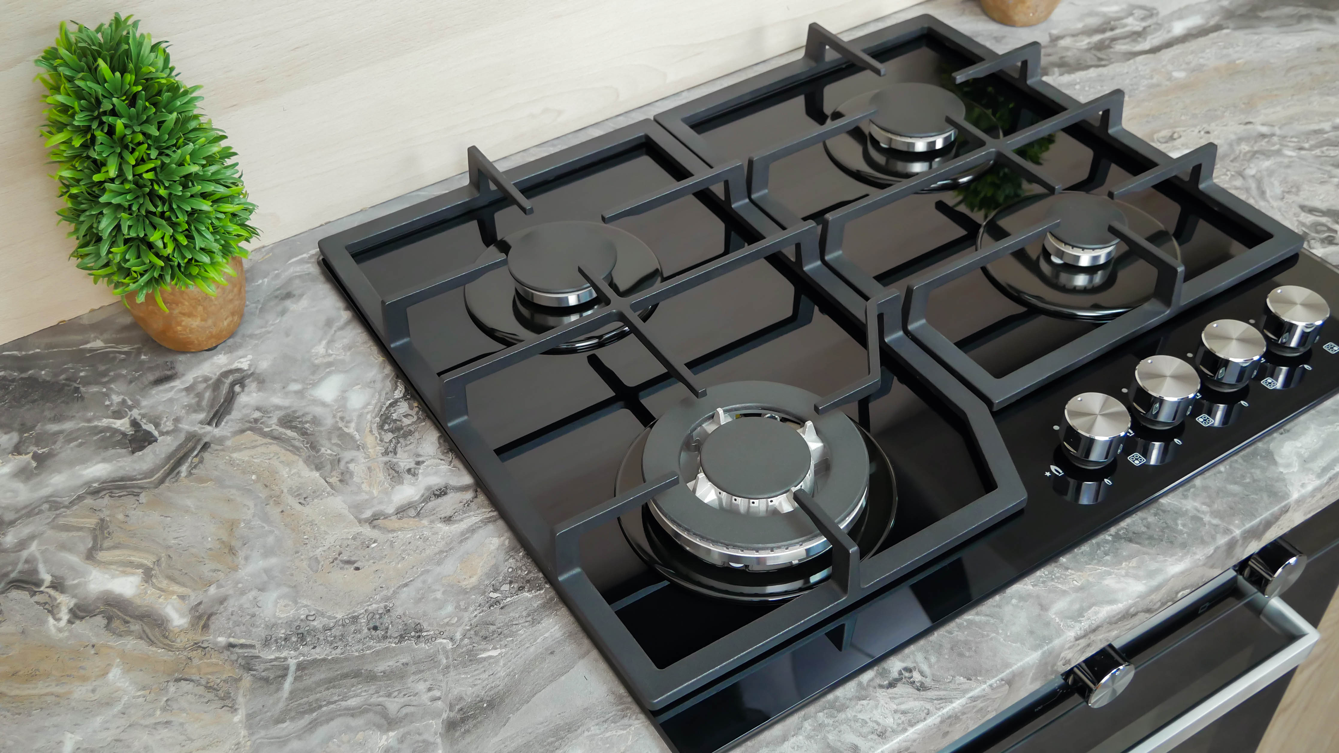 How to clean a gas stove top to make it look spotless