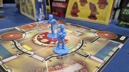 Star Trek: Away Missions models on the game's board, with boxes in the background