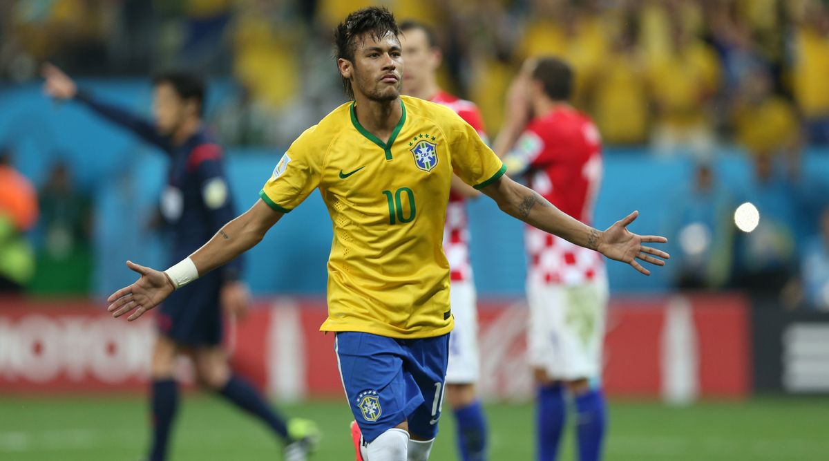 Neymar of Brazil celebrates after scoring his country&#039;s second goal of the opening match of the 2014 FIFA World Cup against Croatia on 12 June, 2014 in Sao Paulo, Brazil