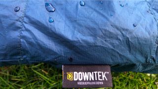 Alpkit Pipedream 400 sleeping bag label showing DWR credentials
