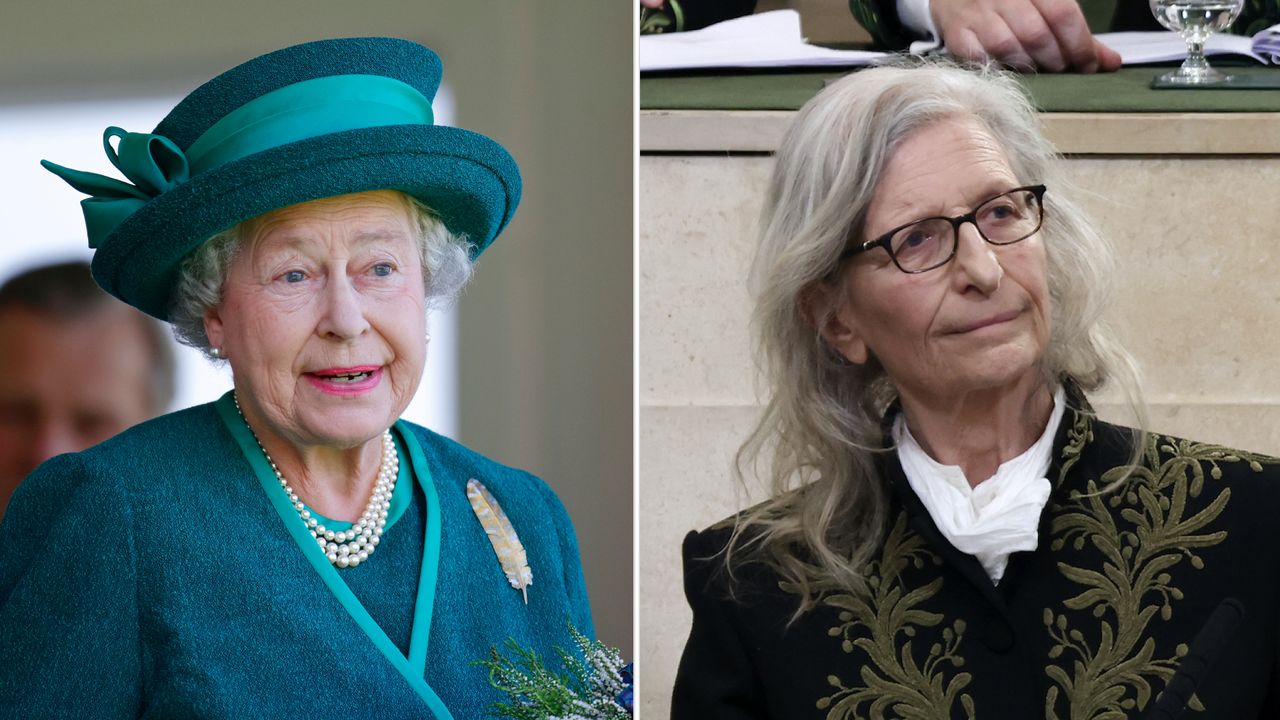 Queen Elizabeth wears a green suit and matching hat and Annie Leibovitz wears a black and gray jacket