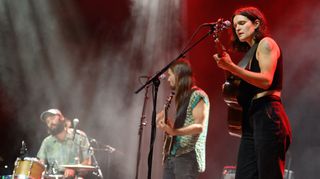 (left to right) James Krivchenia, Max Oleartchik and Adrianne Lenker of Big Thief perform on stage during the 2021 Pitchfork Music Festival at Union Park on September 10, 2021 in Chicago, Illinois