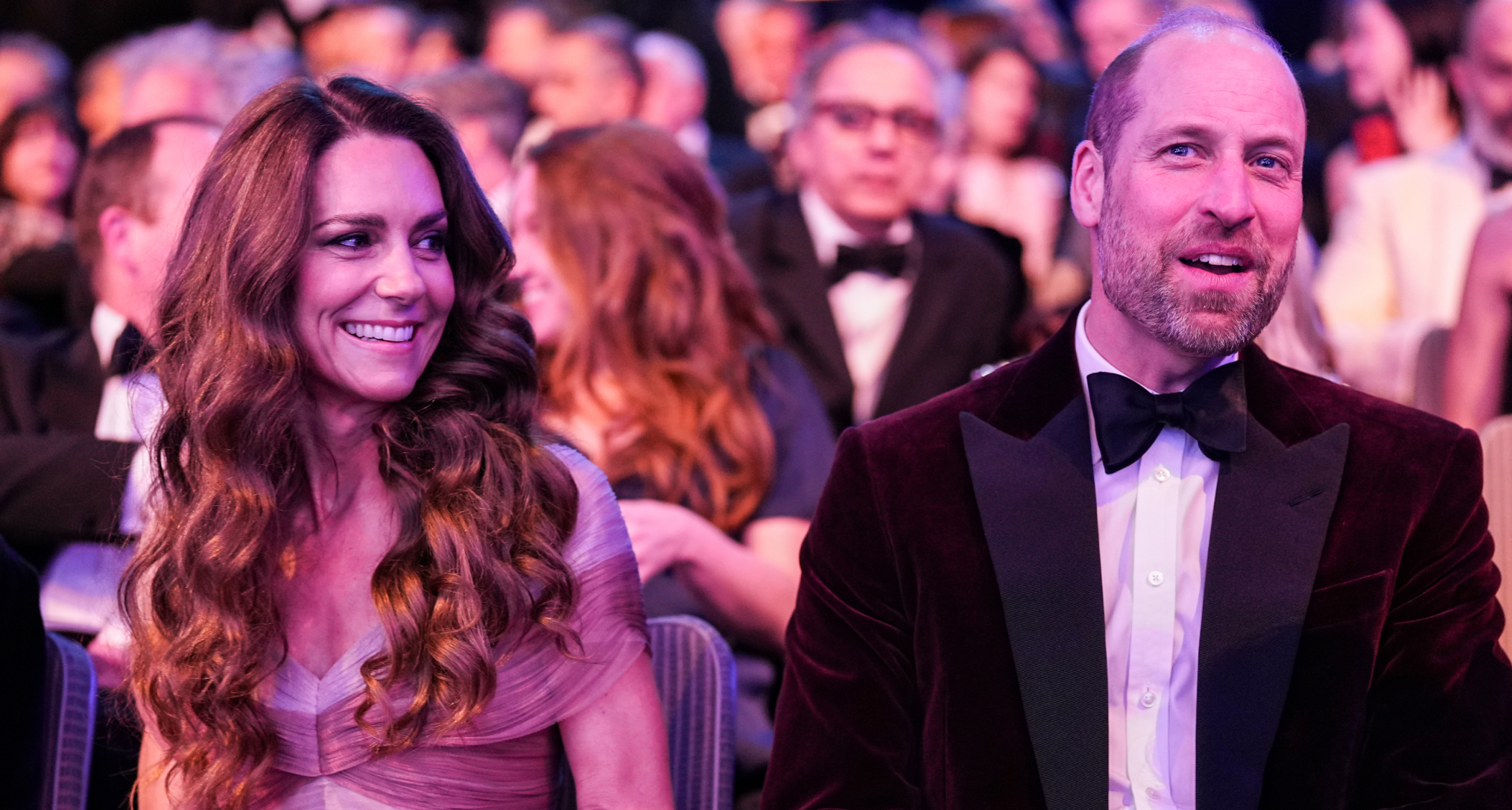 Princess Kate sitting at the BAFTAs in a pink gown