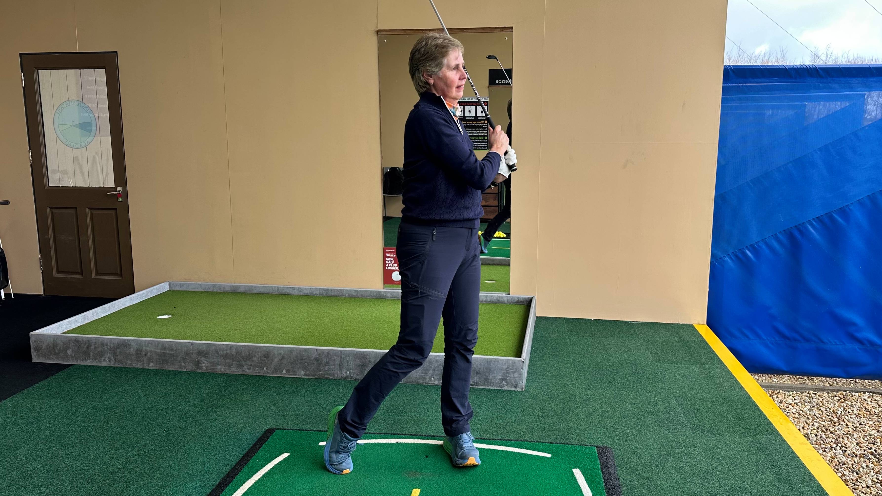 Female golfer at the range