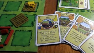 Photographs of the Agricola board game in play