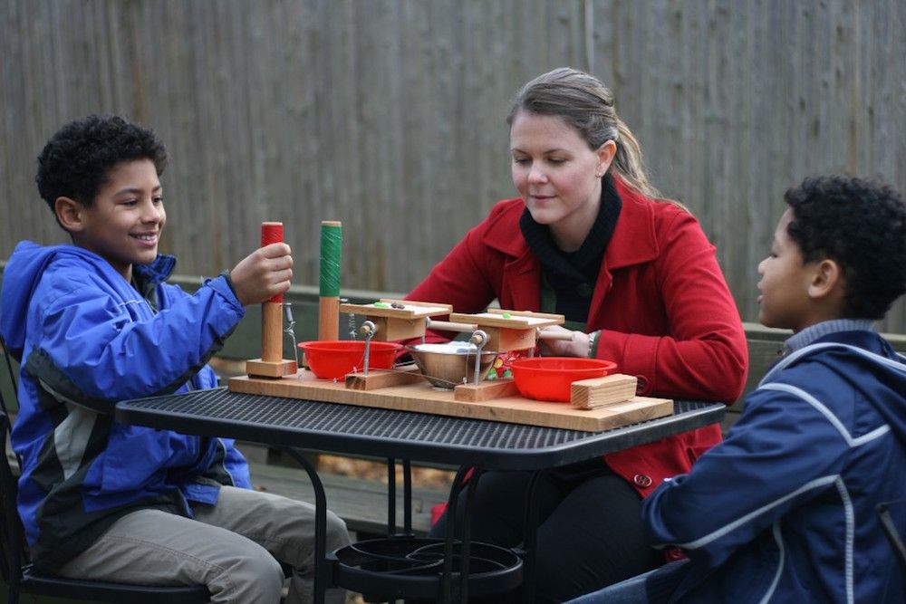 children playig a fairness game