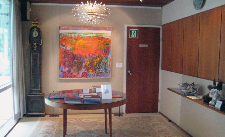 dining room with an early version of a wall mounted dimmer switch