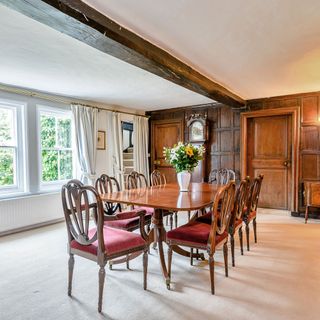 dining room with table and carpet floor