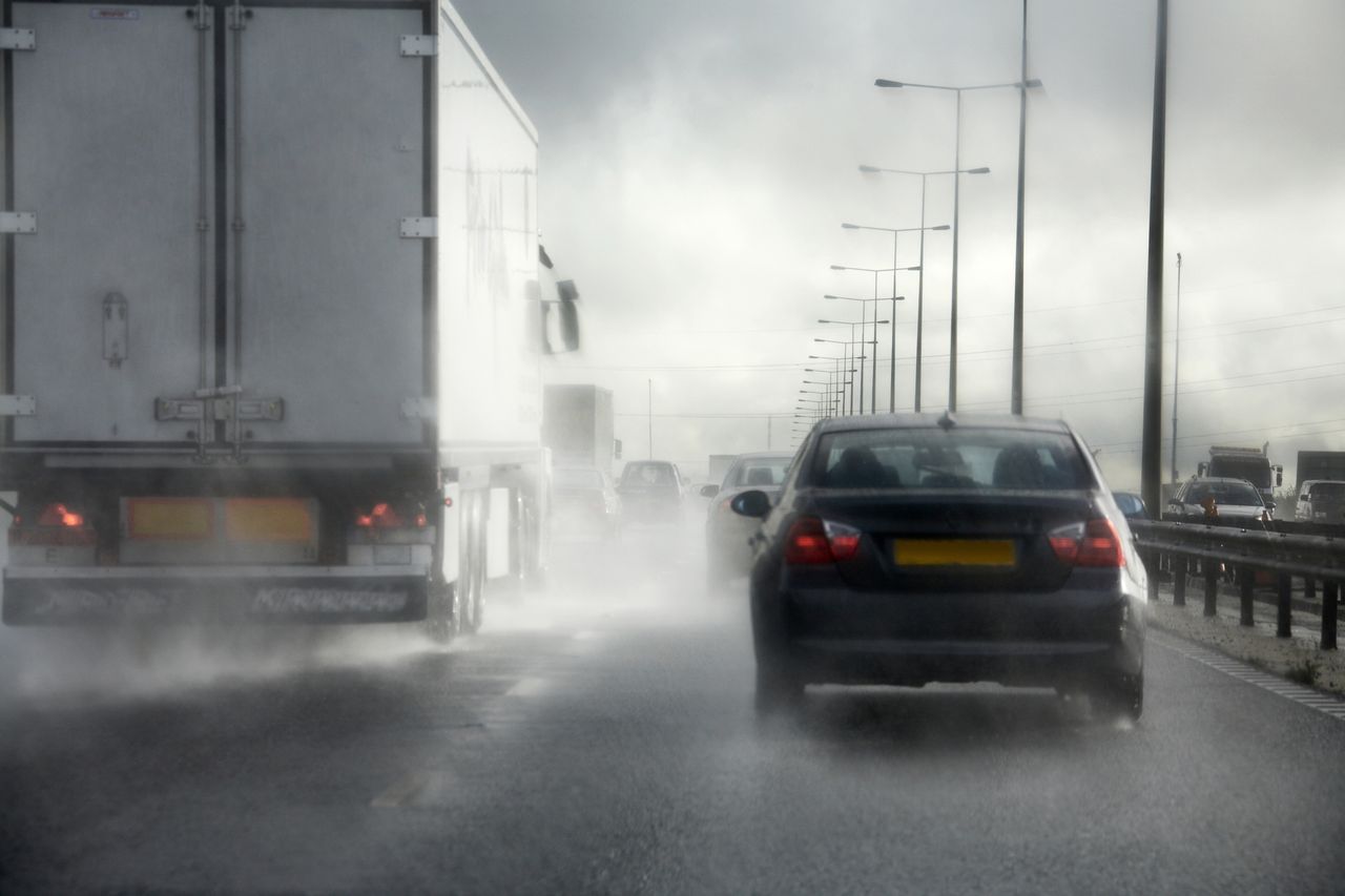 Road traffic driving in bad weather on motorway 