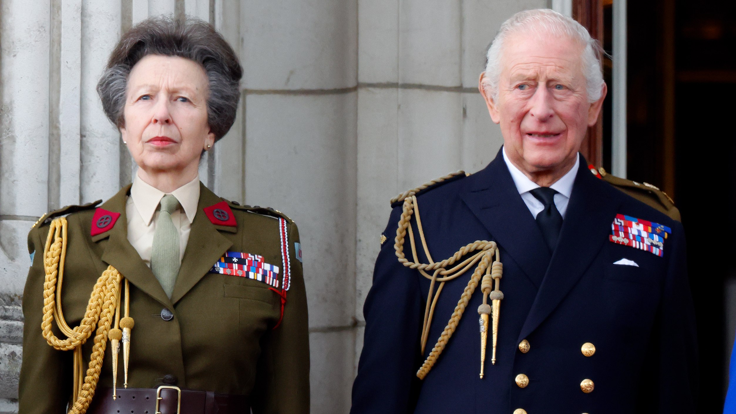 Princess Anne and King Charles III watch a flypast from the balcony of Buckingham Palace to mark the 80th anniversary of VE Day on May 5, 2025