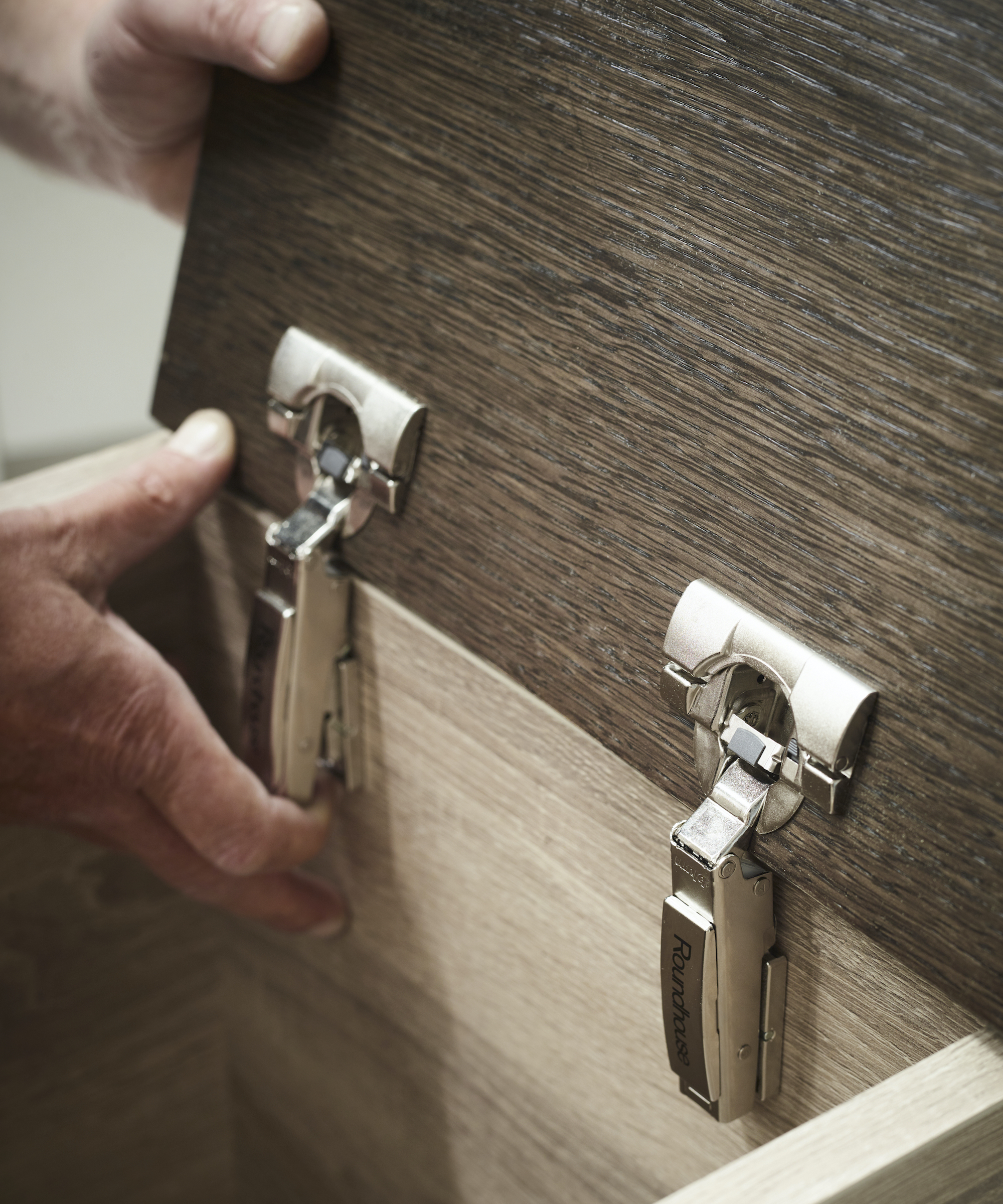 close up of cabinet hinges