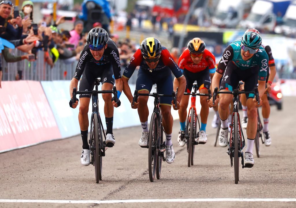 Team DSMs French rider Romain Bardet L Team Ineos Ecuadorian rider Richard Carapaz 2nd L Team Bahrains Spanish rider Mikel Landa C and Team Boras Australian rider Jai Hindley R sprint to the finish line during the 9th stage of the Giro dItalia 2022 cycling race 191 kilometers between Isernia and the Blockhaus mountain in the Majella national park near Chieti southern Italy on May 15 2022 Photo by Luca Bettini AFP Photo by LUCA BETTINIAFP via Getty Images