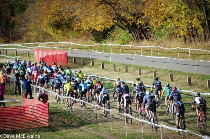 The Elite Men head out to the back side of the course