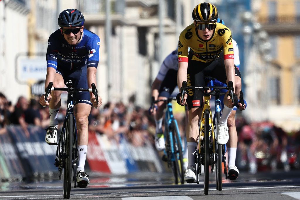 GroupamaFDJs French rider David Gaudu L and JumboVismas Danish rider Jonas Vingegaard R react as they cross the finish line of the 8th and final stage of the 81st Paris Nice cycling race 1175 km between Nice and Nice on the Promenade des Anglais of the French riviera city of Nice southeastern France on March 12 2023 Photo by AnneChristine POUJOULAT AFP Photo by ANNECHRISTINE POUJOULATAFP via Getty Images