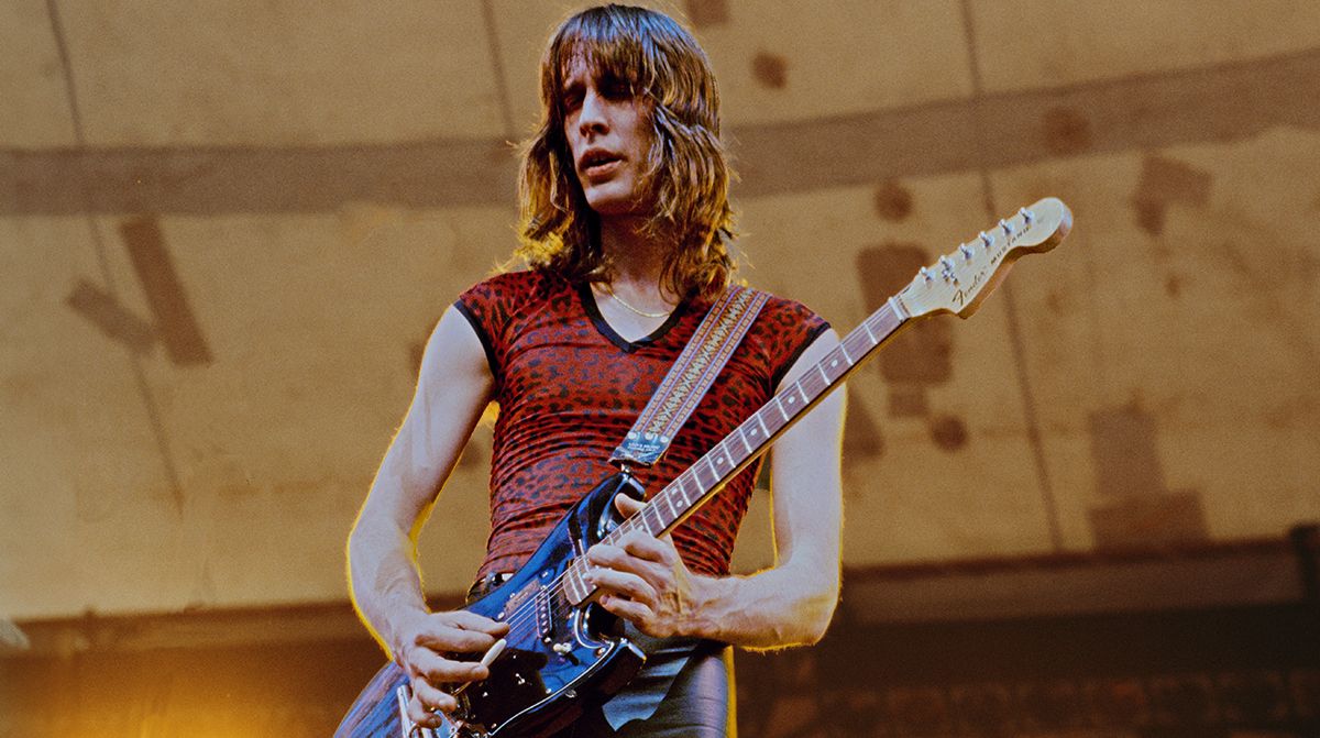 American singer-songwriter, musician and record producer, Todd Rundgren, performs live on stage playing a Fender Mustang guitar with Todd Rundgren&#039;s Utopia at the Dr. Pepper Central Park Music Festival at Wollman Rink in Central Park, New York City, 11th July 1979. 