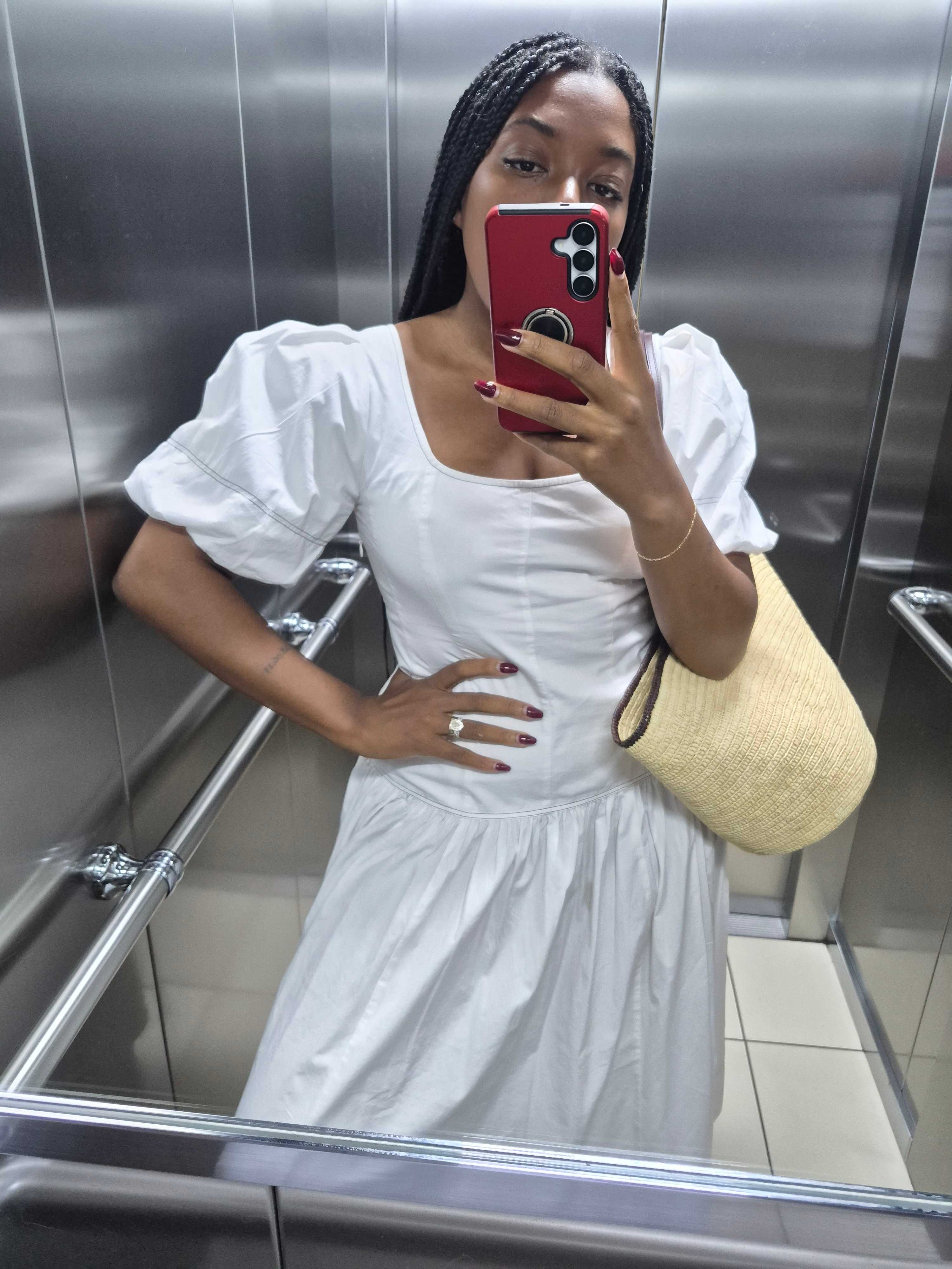 Fashion editor Remy Farrell wears the M&amp;amp;S pure cotton drop waist midi waisted dress.