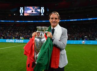 Italy coach Roberto Mancini celebrates the Azzurri's Euro 2020 win in 2021.