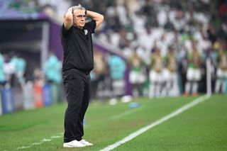 Mexico coach Gerardo Martino gestures during his side's World Cup match against Saudi Arabia.